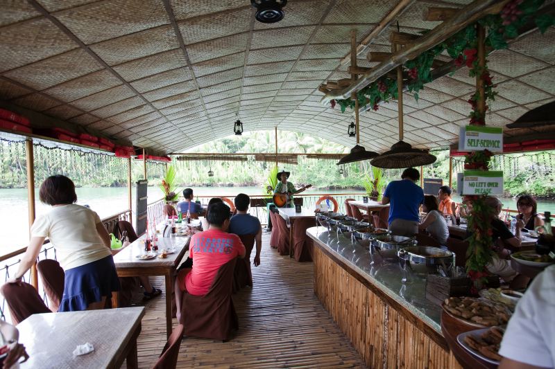 Tourist Boat Heading Down the Loboc River